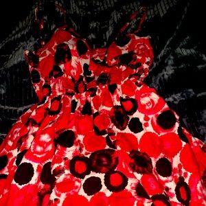 Red and black summer dress loose fitting! It’s in ok condition.